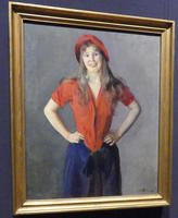 Painting of woman in red hat and blouse and  blue skirt; hands on hips.
