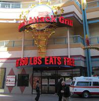 Exterior of Heart Attack Grill; sign reads “Over 350 lbs eats free”