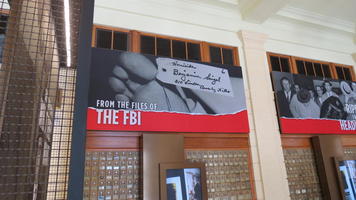 Large poster on wall showing Bugsy Siegel's toe tag.