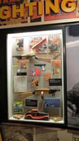 Display case with “G-Man” toys.