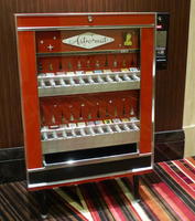 Cigarette machine modified to dispense small works of art