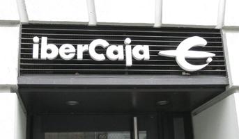Sign for iberCaja followed by stylized euro symbol.