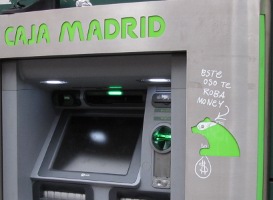 ATM with graffiti on bank's symbol