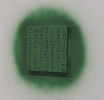 Square 7 x 7 grid of capital letters spray-painted green