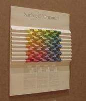 Accordion-folded paper with spectrum of colors