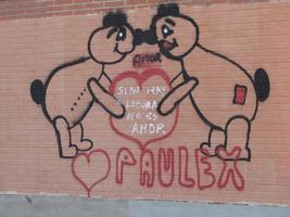Two cartoon figures leaning over a heart labeled with “If there is no madness, it is not love.”