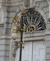 Lamps in front of palace, showing gold trim
