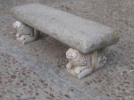 Bench with stone lions as its feet