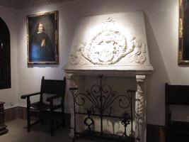 Fireplace with carved mantel