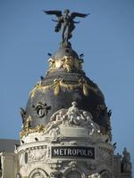 Gold-adorned dome of Metropolis hotel