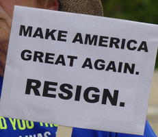 Sign: Make America Great Again. Resign.