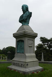 Grave of Horace Greeley with his bust atop the marker