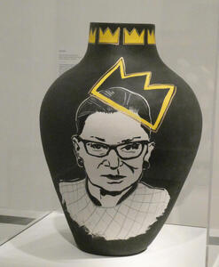 Vase with drawing of Ruth Bader Ginsburg wearing a line-drawing crown