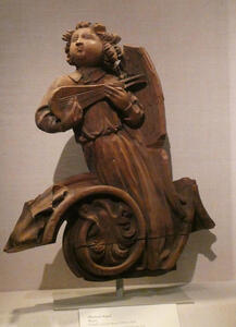 Sculpture of person playing lute