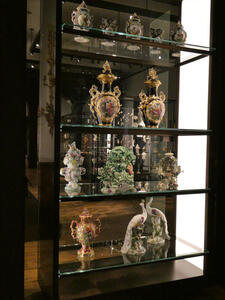 Display case with ornate vases