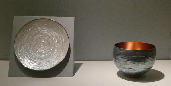 At left, mother-of-pearl dish. At right, mother-of-pearl bowl with copper interior