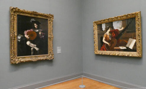Portraits: at left, man playing lute; at right, woman playing lute