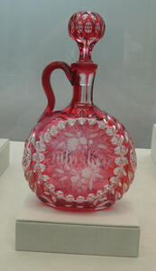 Pink glass bottle with handle