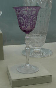 Drinking glass with purple glass bowl and clear stem