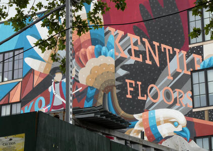Eagle in red, white, and blue. Text: Kentile Floors