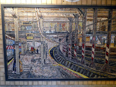 Mosaic of subway station showing platform and tracks