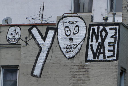 Graffitti with skull that has three eyes