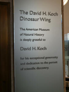 Plaque reading: The David H. Koch Diosaur Wing / The American Museum of Natural History is deeply grateful to David H. Koch for his exceptional generosity and dedication to the pursuit of scientific discovery