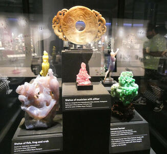Sculpture of fish in chalecdony,  musician in beryl, incense burner in jade
