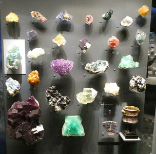 Green, purple, yellow, orange fluorite mineral samples