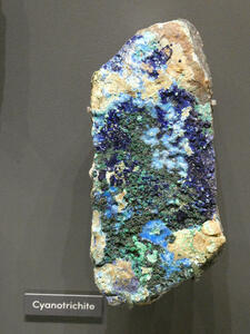 Sample of cyanotrichite with green, blue, and yellow highlights