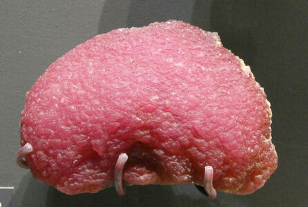 Pink mineral with a sponge-like texture