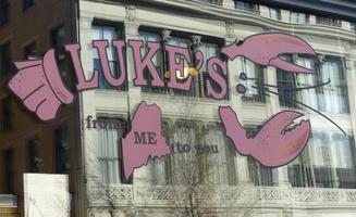 Sign for “Luke's Lobsters” in shape of a lobster, with caption “From ME to you”