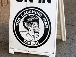 Logo for “The Laughing Man” Tavern