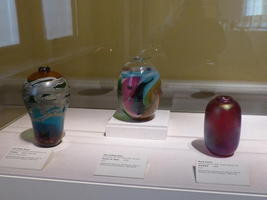 Three small multi-coloured glass vases