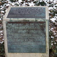 Stone block with text about memorial to the victims of communism