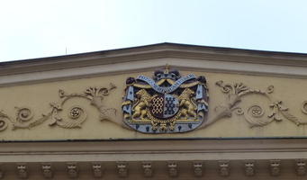 Heraldic coat of arms atop a building