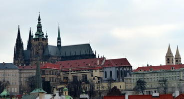 View of church with sharp spires from Karlův most
