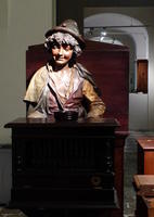 musical automaton in carved young boy