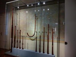Assortment of wind instruments, one about 2 m tall