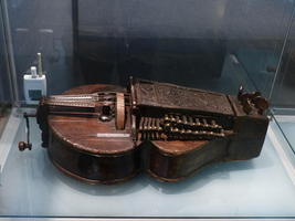 Hurdy gurdy (looks like a violin with a crank at the bottom and no neck).