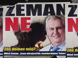 Political poster with candidate in foreground and explosion in background