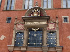 Detail of building with “Prague,capital of the kingdom” in gold inscribed letters