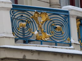 Railing with blue spiral and gold circular design
