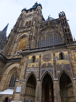 Gold leaf painting above arches of St. Vitus Cathedral