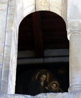 Painting of Madonna & Child seen through second floor archway