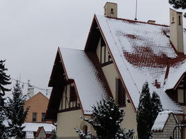 House with peaked roof, brown trim