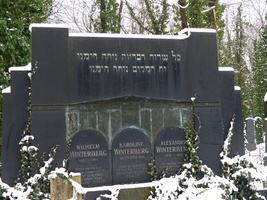 Grave marker for family of three, Hebrew lettering on top