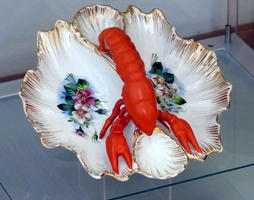 Ceramic lobster bowl with flower design and lobster as handle