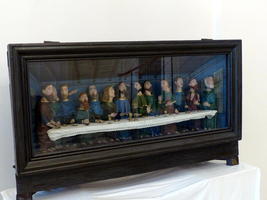 Painted wooden “Last Supper” in a display case