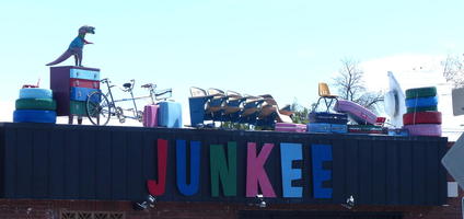 Random junk atop store named “Junkee”
